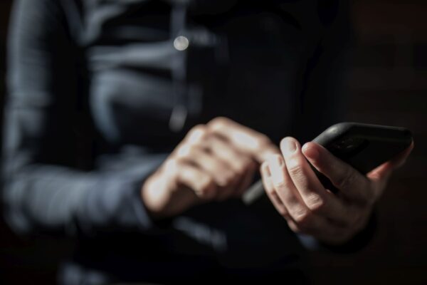 men with celular in hand